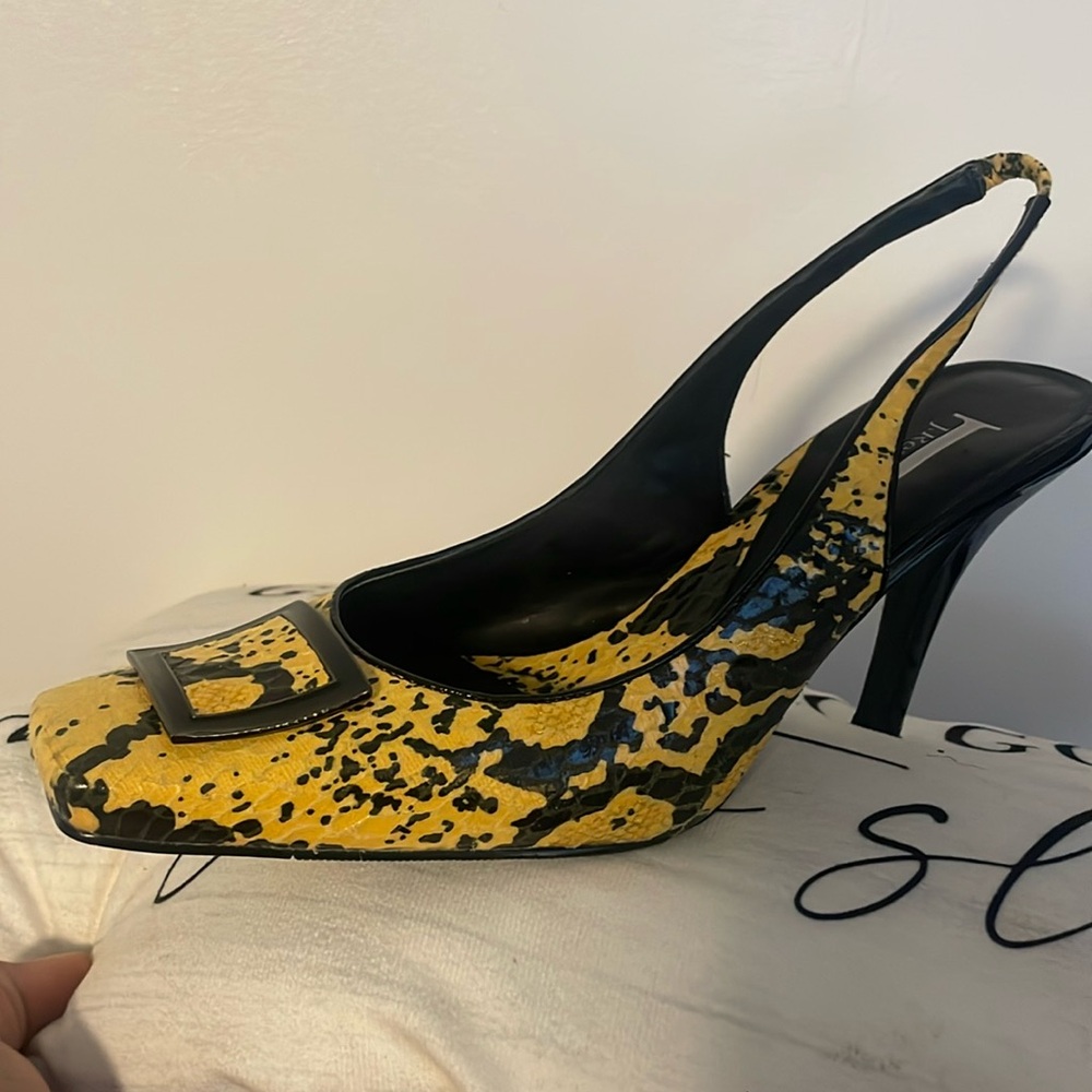 Yellow and black women’s snake skin high heels size 10